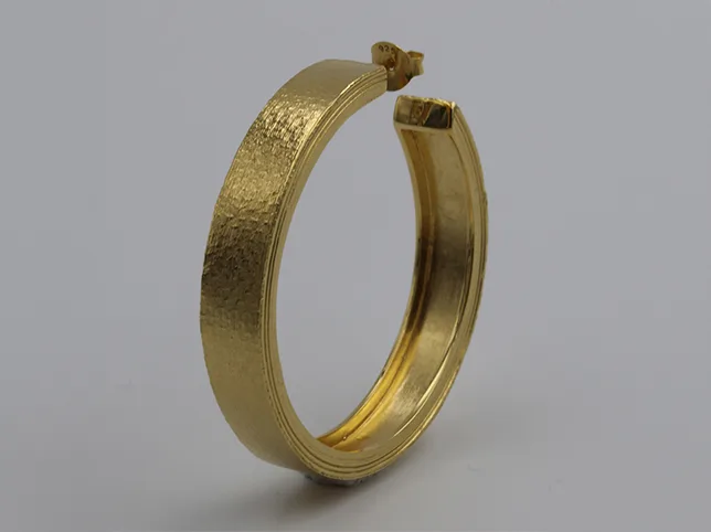 Jewellery product photo before stones and metal were cleaned and sharpened for an Amazon listing