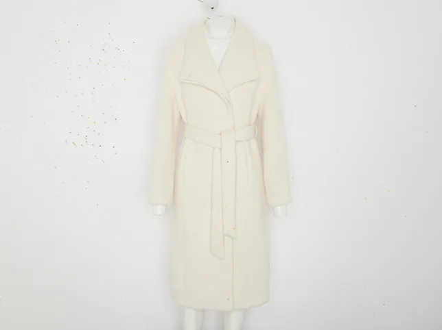 Cream belted coat before natural shadow creation