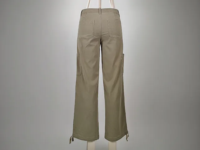 Wide-leg cargo trousers before a fabric colour change from khaki to green