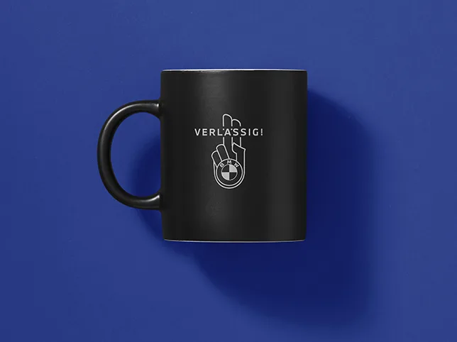 Black branded mug before the scene tint was shifted from blue to magenta