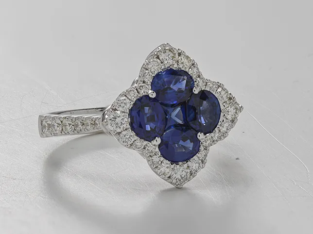 Sapphire quatrefoil ring before being clipped out and grounded with a shadow