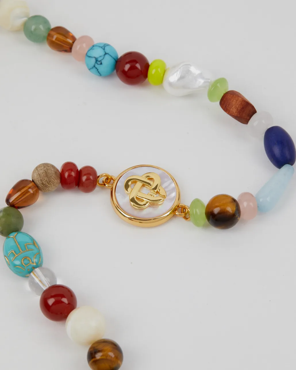 Multi-stone beaded bracelet before a floating cast shadow was created