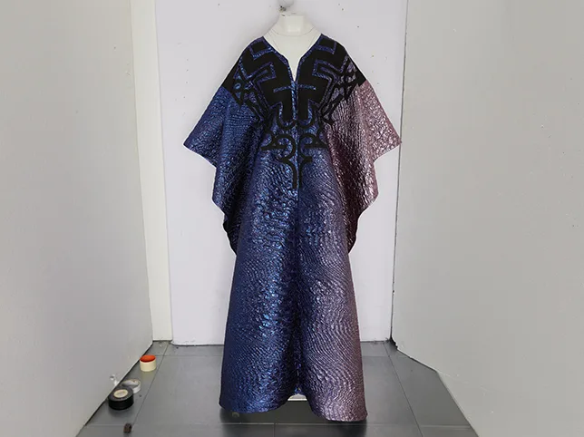 Boutique garment before fabric texture and weave detail were brought back