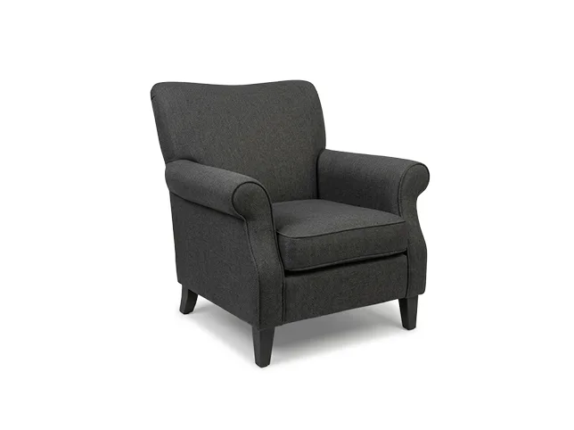 Dark grey upholstered armchair after furniture and interiors editing