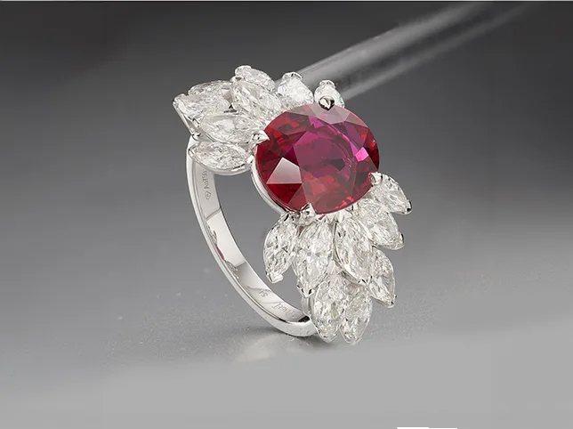 Ruby and diamond cocktail ring before advanced retouching onto a clean background
