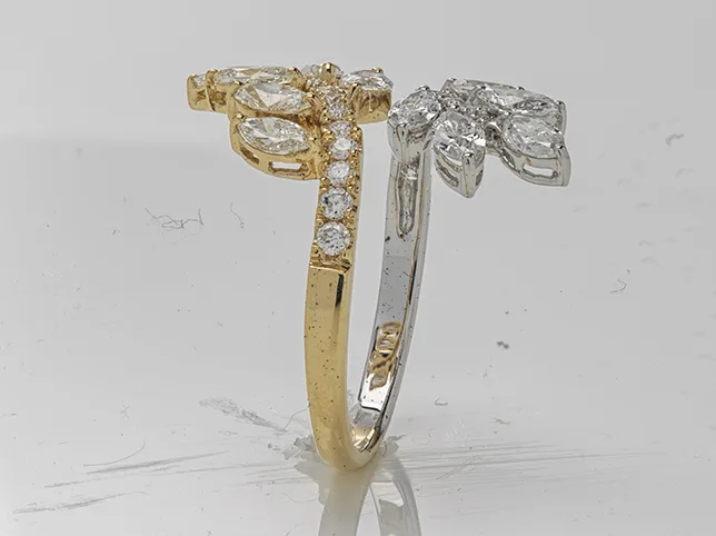 Two-tone bow ring before retouching