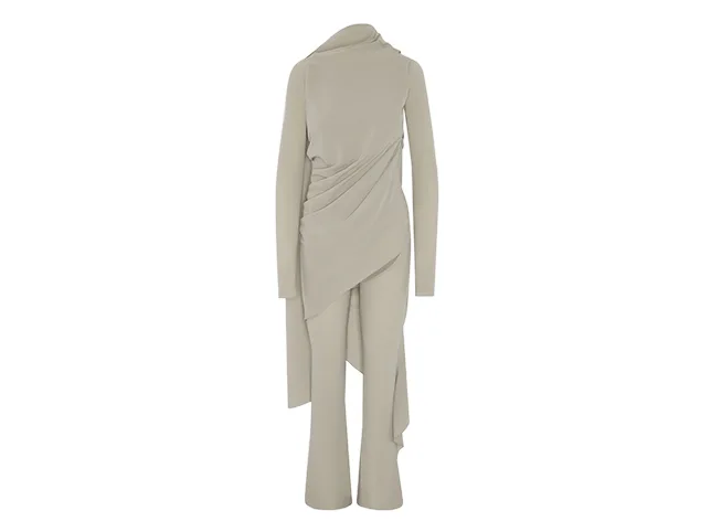 Beige draped dress with creases relaxed and the drape reading as intended