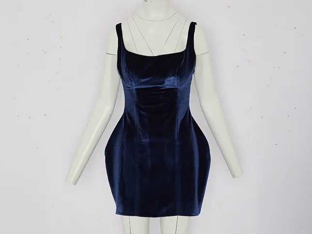Navy velvet mini dress before the model was removed and the garment shaped to stand on its own