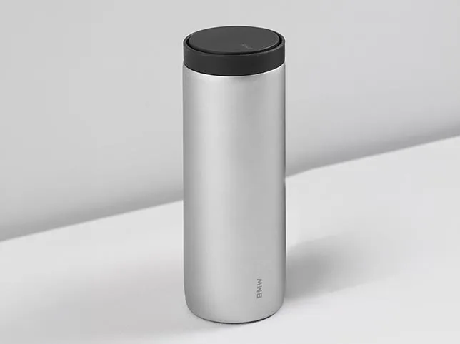 Insulated travel tumbler before a commercial colour change from silver to yellow