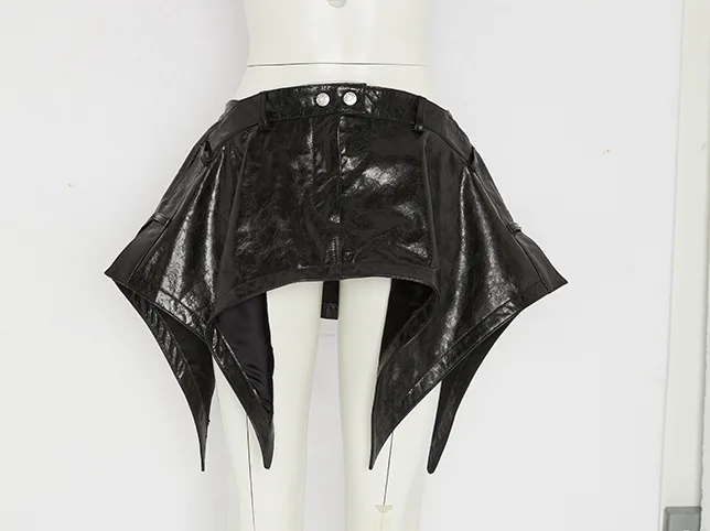 Black leather cropped top before streetwear retouching to one drop standard