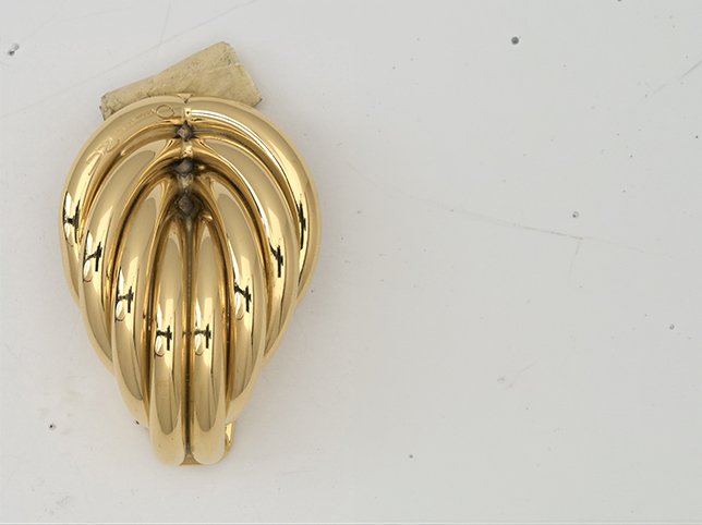Gold earrings before retouching