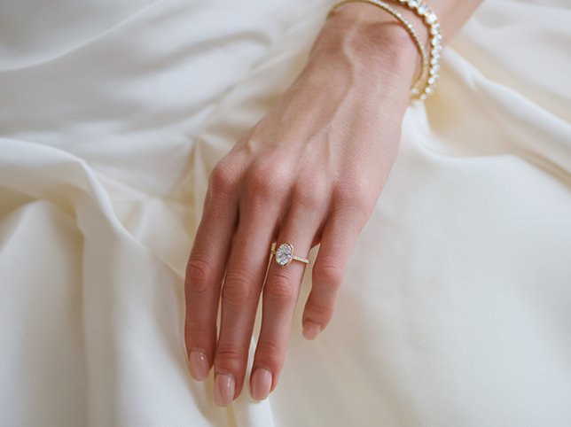 Model wearing jewellery before retouching