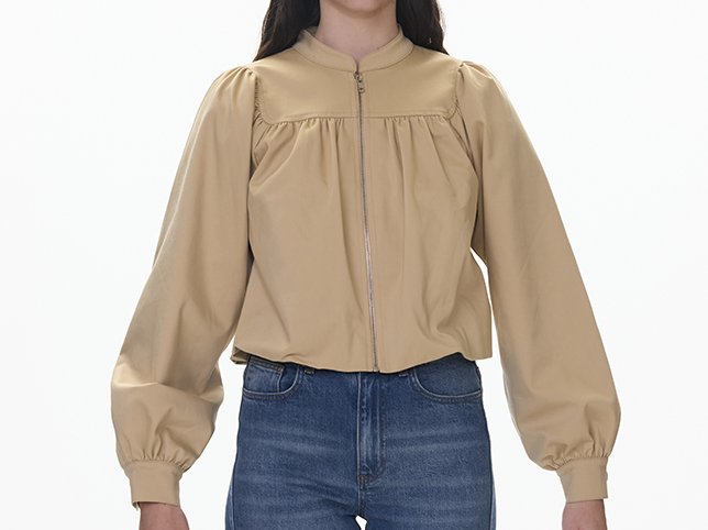 Jacket on a mannequin before sleeve joint retouching